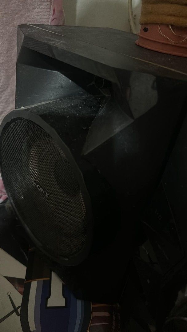 Sony MHC-ECL70 Home Audio System with DVD and Speakers (Category: Soundbars, Speakers & Amplifiers) located in Manila. Submitted by thomyorke14 (Listing ID 1468978052, Image 3). Description: - Brand: Sony MHC-ECL70 Home Audio System - Power Output: 470W RMS / 5170W PMPO - Includes: Main unit and two matching speakers - Features: Built-in DVD player, USB recording/playback, mic input, audio-in, and bass boost - Condition: Dusty from storage, but t