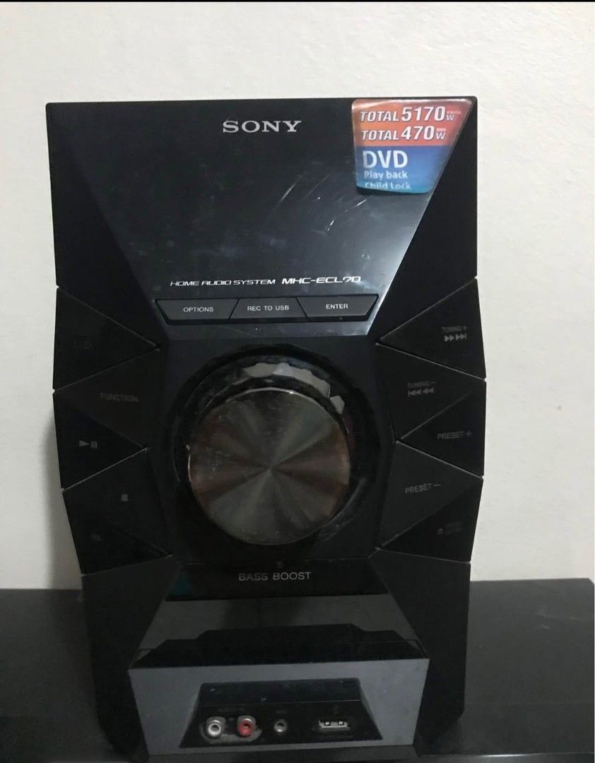 Sony MHC-ECL70 Home Audio System with DVD and Speakers (Category: Soundbars, Speakers & Amplifiers) located in Manila. Submitted by thomyorke14 (Listing ID 1468978052, Image 2). Description: - Brand: Sony MHC-ECL70 Home Audio System - Power Output: 470W RMS / 5170W PMPO - Includes: Main unit and two matching speakers - Features: Built-in DVD player, USB recording/playback, mic input, audio-in, and bass boost - Condition: Dusty from storage, but t