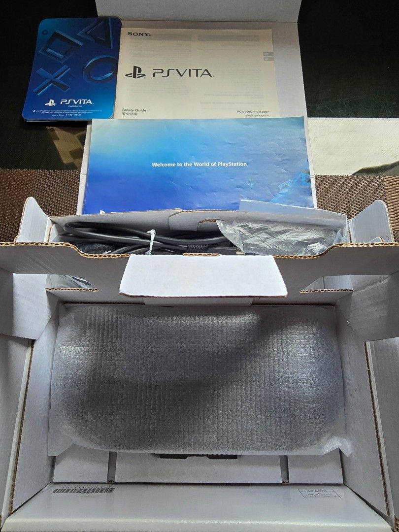 PS Vita 2000 Black (Category: PlayStation) located in Paranaque City. Submitted by r3tr0_n3m3sis (Listing ID 1468947615, Image 3). Description: (PlayStation Vita 2000 Black) Inclusion: - PlayStation Vita Slim 2000/Black - Sony PS Vita AC Adapter Charger - Playstation Vita AR Cards - PS Vita 16gb Memory Card - User Manual and Box - PS Vita Pouch Case - Loaded with Popular Games - Firmware 3.65 Henkaku Ensō-2 Good for Retro Collection! Already Modd