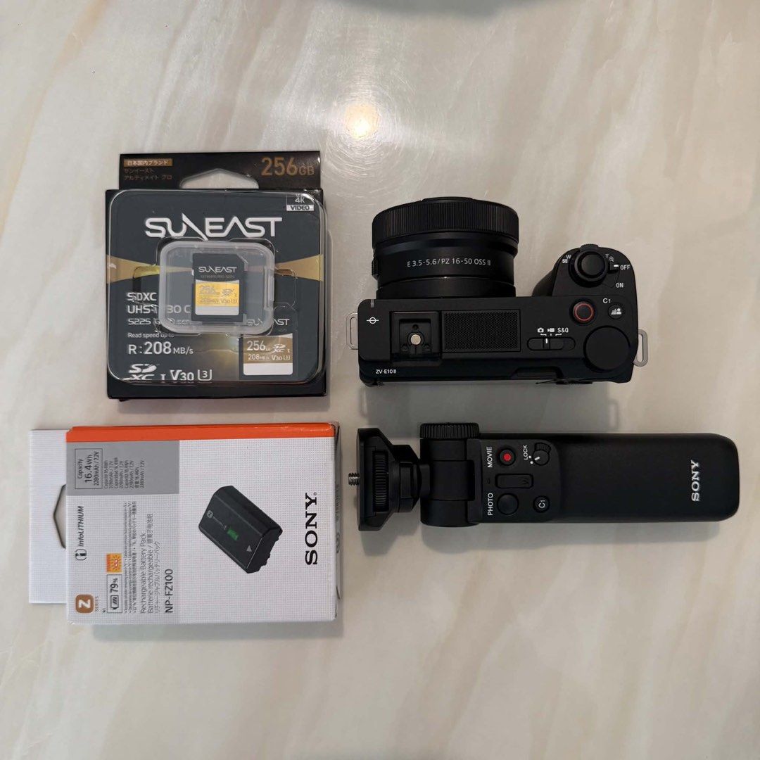 Sony ZV-E10 II E PZ 16-50mm OSS II Camera Kit (Category: Cameras) located in Quezon City. Submitted by wendyyys (Listing ID 1468949373, Image 3). Description: - Camera: Sony ZV-E10 II Mirrorless Camera - Lens: E PZ 16-50mm F3.5-5.6 OSS II Lens - Included Accessories: Original box, extra NP-FZ100 battery pack, 256GB Suneast SDXC memory card, and wireless shooting grip - Condition: Fully boxed, excellent setup - Best For: Vlogging and all-in-one co