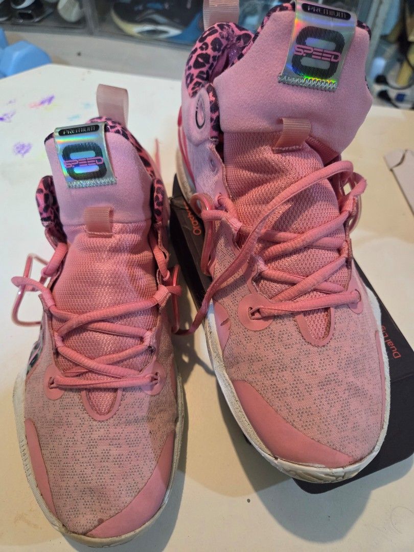 Speed 8 linning shoes (Category: Sneakers) located in Manila. Submitted by isen45 (Listing ID 1469119267, Image 2). Description: - Color: Bright pink with leopard print lining and accents - Features: Holographic speed tag on the tongue, secure lace-up closure - Soles: White rubber with a reliable grip pattern - Condition: Pre-owned with minor dirt marks on the fabric and soles - Perfect for adding a pop of fun to your workout or casual outfit!.