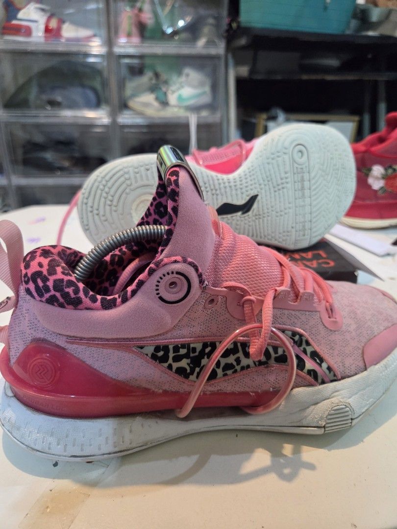 Speed 8 linning shoes (Category: Sneakers) located in Manila. Submitted by isen45 (Listing ID 1469119267, Image 1). Description: - Color: Bright pink with leopard print lining and accents - Features: Holographic speed tag on the tongue, secure lace-up closure - Soles: White rubber with a reliable grip pattern - Condition: Pre-owned with minor dirt marks on the fabric and soles - Perfect for adding a pop of fun to your workout or casual outfit!.