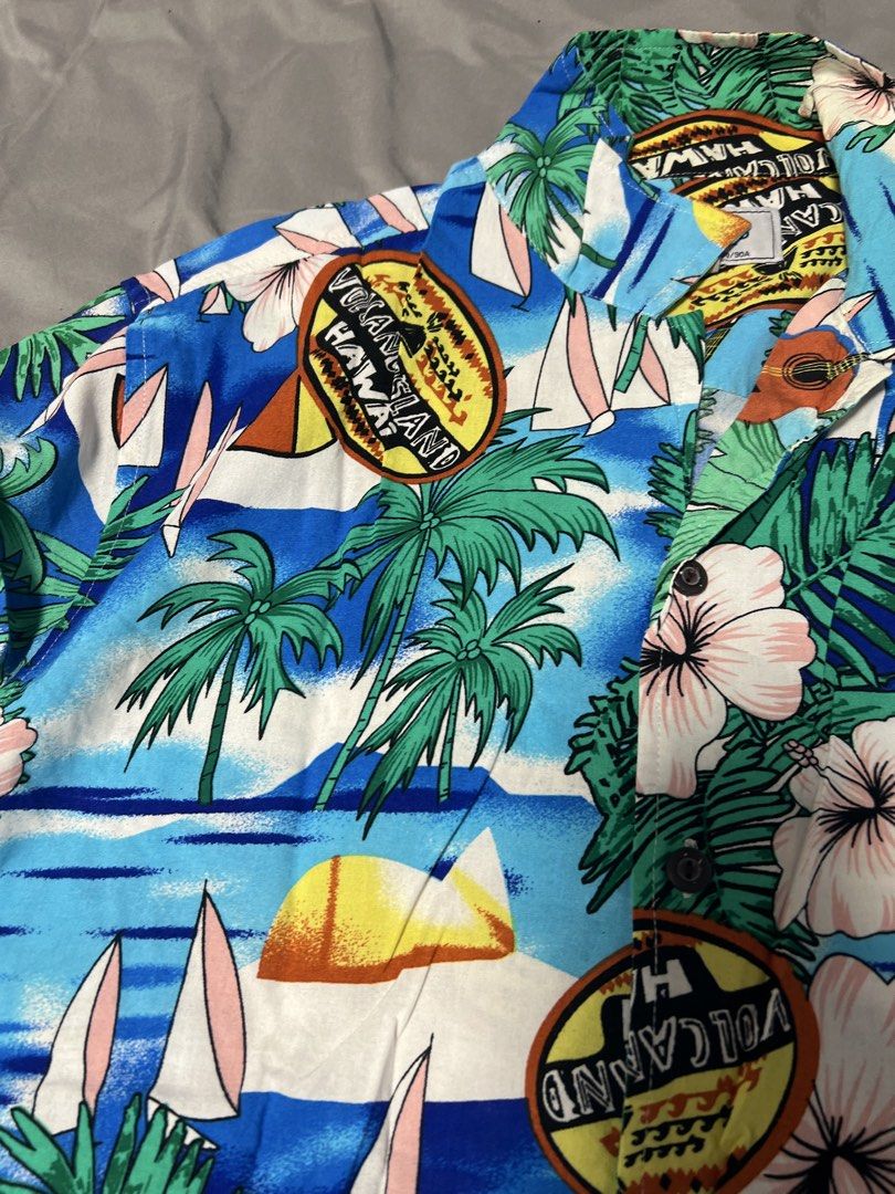 Springfield Hawaii Tropical Print Shirt (Category: Tshirts & Polo Shirts ) located in Marikina City. Submitted by pepitsells (Listing ID 1469043665, Image 2). Description: short sleeve button-down with an all-over tropical print with palm trees, hibiscus, surfboards, sailboats, and ukuleles vibrant blue ocean background ideal for summer, vacations, beach days, and casual wear! in excellent pre-loved condition size Large (28Lx21W) RFS: not being u