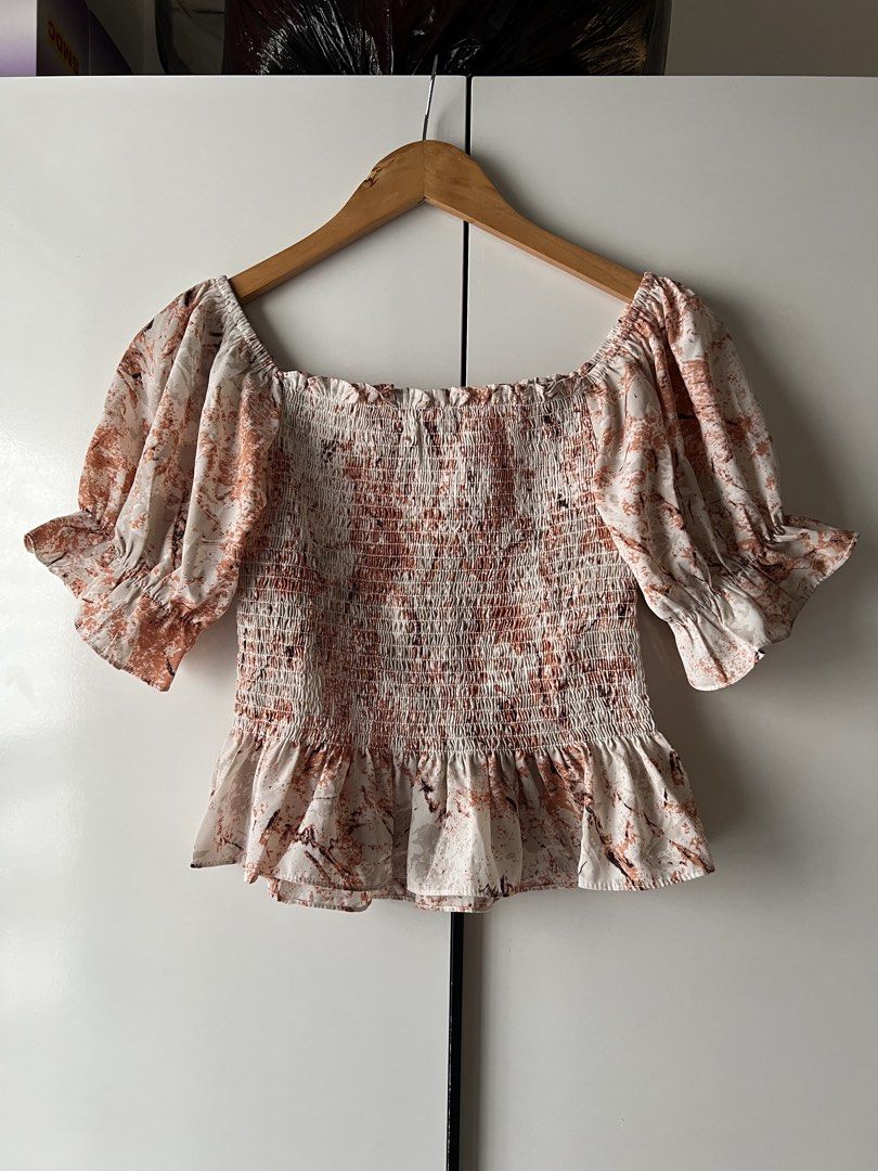 Square neck smocked peplum blouse orange (Category: Blouses) located in Mandaluyong City. Submitted by katecdp (Listing ID 1469160143, Image 1). Description: Fits small to medium only 👗 Seller reference: 5’5’ height, 34” bust, 29” waist 💸 MOP: GCash, BPI QR Decluttering my closet with items mostly used for events. Feel free to browse my other listings too. Slightly nego, no to lowballers! .