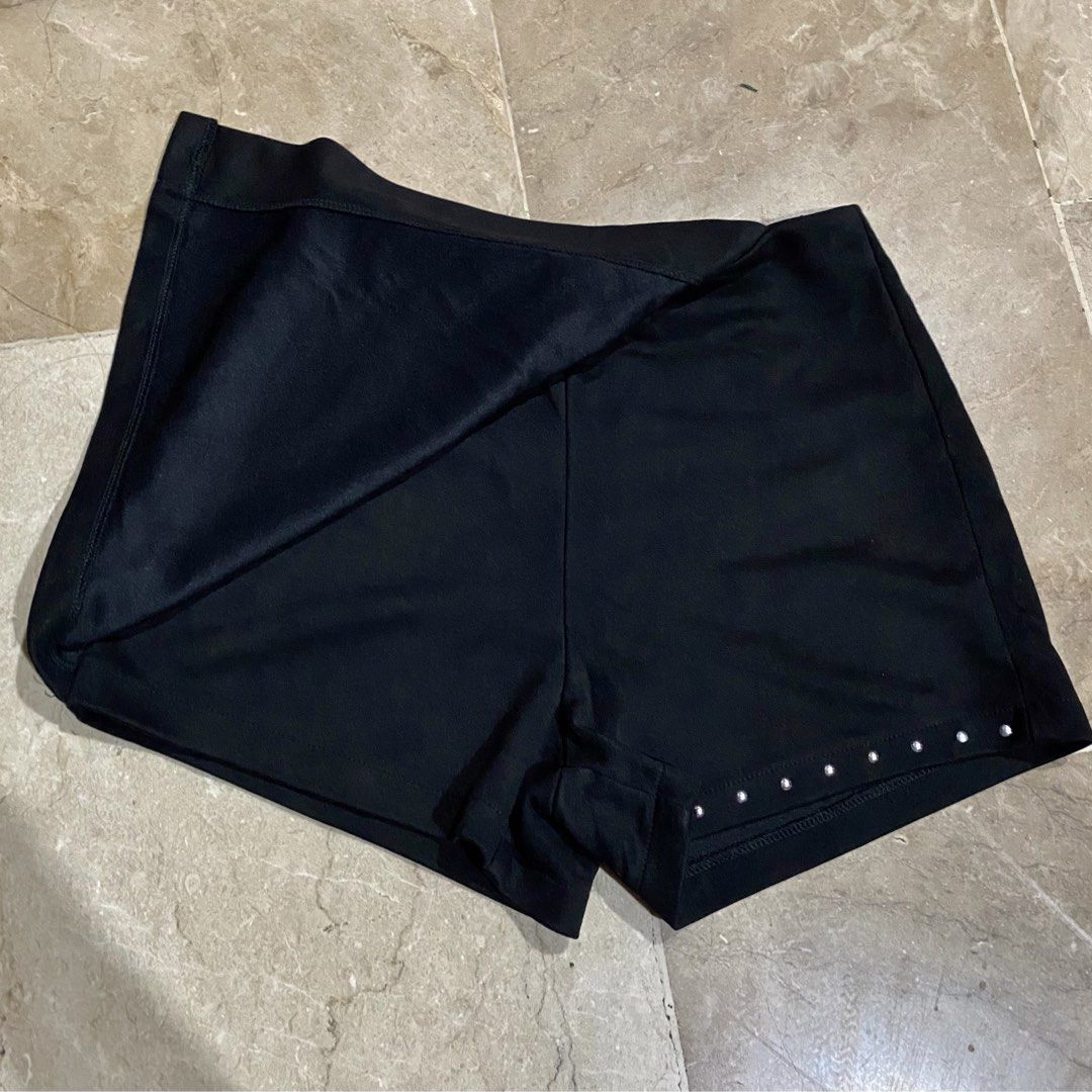 🔥STARBELLE Black Studded Wrap Skorts -Size S (Category: Skirts) located in Cebu City. Submitted by kantocloset_ubec (Listing ID 1469017966, Image 3). Description: - Brand: STARBELLE | Small - Black velvet fabric - Skort | Wrap-style front overlay with edgy silver studs along the hem and flap edge - Closure: Hidden back zipper - Like new / No flaws - Perfect for: Nights out or casual weekend wear.