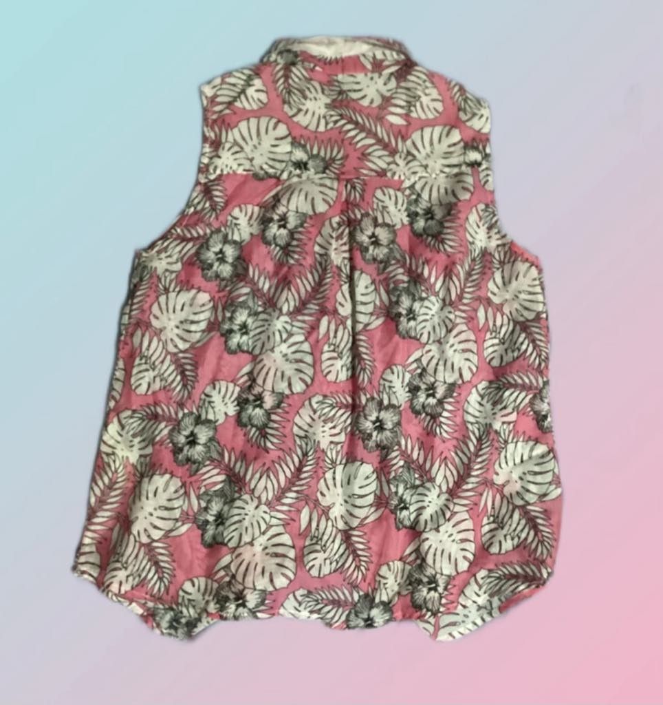 Stradivarius Floral Sleeveless Button-Up Shirts (Category: Sleeveless) located in Paranaque City. Submitted by calm_youngstore7 (Listing ID 1469038018, Image 3). Description: - Brand: Stradivarius - sleeveless button-up shirts - Design 1: Pink base with tropical leaf prints and flowers (comes with original tag) - Design 2: Cream background with purple and yellow floral patterns - Features: Collared neckline, curved hem - Fabric: Lightweight, idea