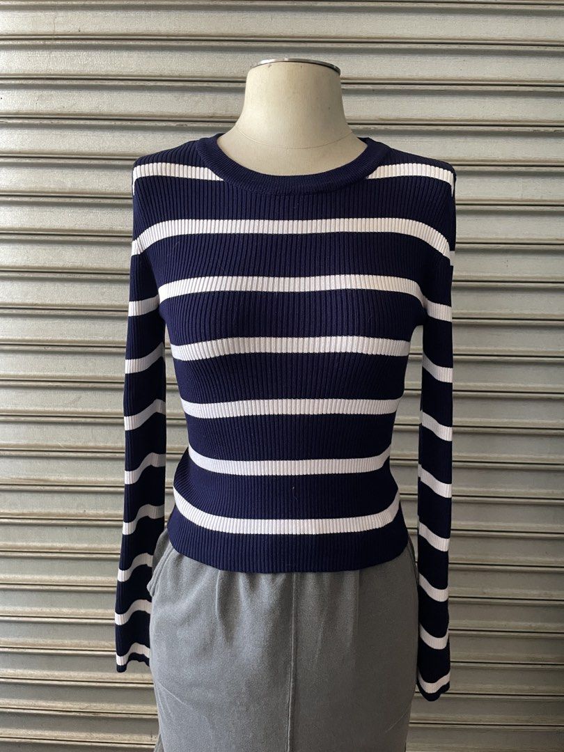 Stradivarius Navy Blue Striped Ribbed Sweater Size M (Category: Longsleeves) located in Davao. Submitted by riab_qt (Listing ID 1468945512, Image 1). Description: - Brand: Stradivarius - Size: M (tag attached) - Color: Navy blue and white stripes - Material/Texture: Ribbed knit - Details: Crew neckline, long sleeves - Origin: Made in Bangladesh - Condition: Brand new with tag - Style: Classic everyday basic, easy to match with jeans or skirts.