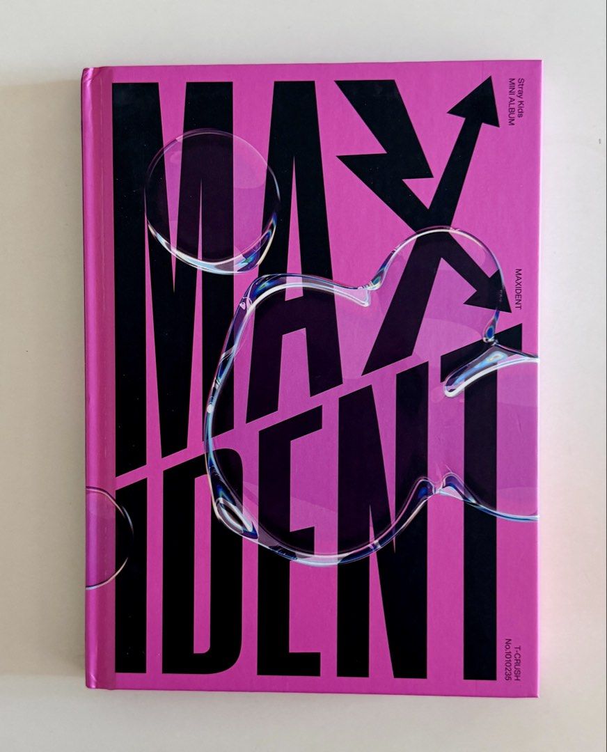 Stray Kids MAXIDENT Mini Album T-CRUSH Version (Category: CDs & DVDs) located in Pasig City. Submitted by ymirgm (Listing ID 1468948536, Image 1). Description: - Album: Stray Kids MAXIDENT (T-Crush Version) - Inclusions: Pink hardcover photobook and matching CD disc - Extras: Lyric paper, folded group poster, and Lee Know photo postcard - Condition: All items included as shown in photos - Ideal for Stray Kids collectors and Stays.