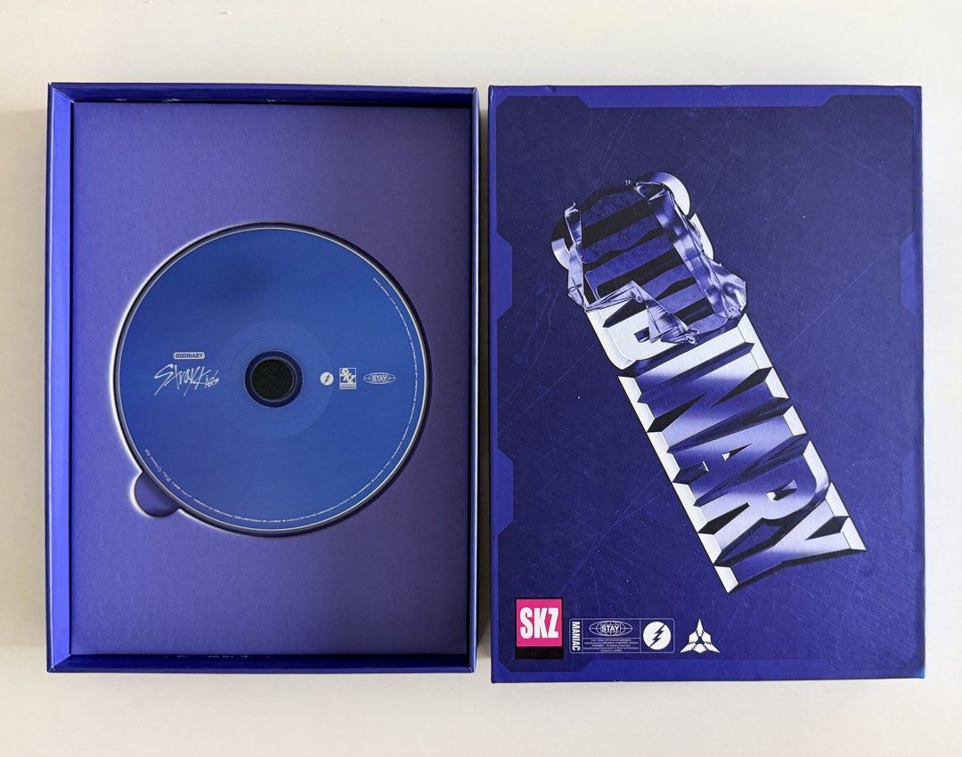 Stray Kids ODDINARY Album Set (Category: CDs & DVDs) located in Pasig City. Submitted by ymirgm (Listing ID 1468946867, Image 2). Description: - Album: Stray Kids ODDINARY (Frankenstein Version) - Inclusions: Purple outer box, CD, photobook, lyric book, and sticker pack - Photocard: Changbin - Condition: Clean, stored safely, and well-maintained - Note: All items shown in the photos are included.