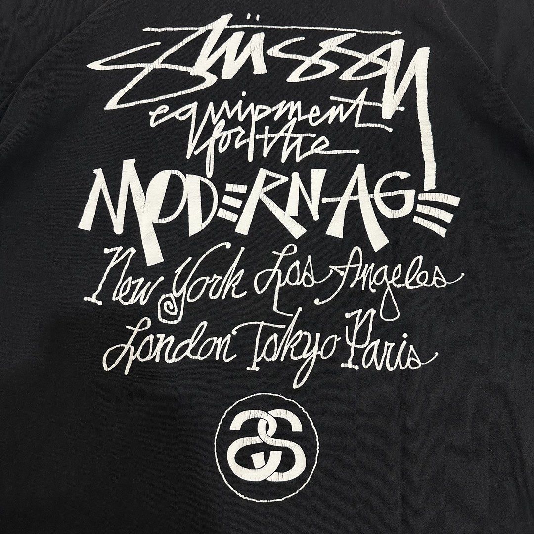 Stussy Modern Age black tee (Category: Activewear) located in Dagupan City. Submitted by unknownlootph (Listing ID 1468944037, Image 3). Description: Size: XXL Width: 26 Length: 30 Condition: 8.9/10 Issue: crackprints only (Legit/Authentic Item).