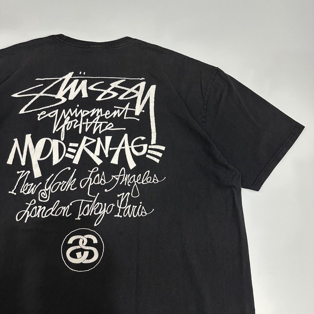 Stussy Modern Age black tee (Category: Activewear) located in Dagupan City. Submitted by unknownlootph (Listing ID 1468944037, Image 2). Description: Size: XXL Width: 26 Length: 30 Condition: 8.9/10 Issue: crackprints only (Legit/Authentic Item).