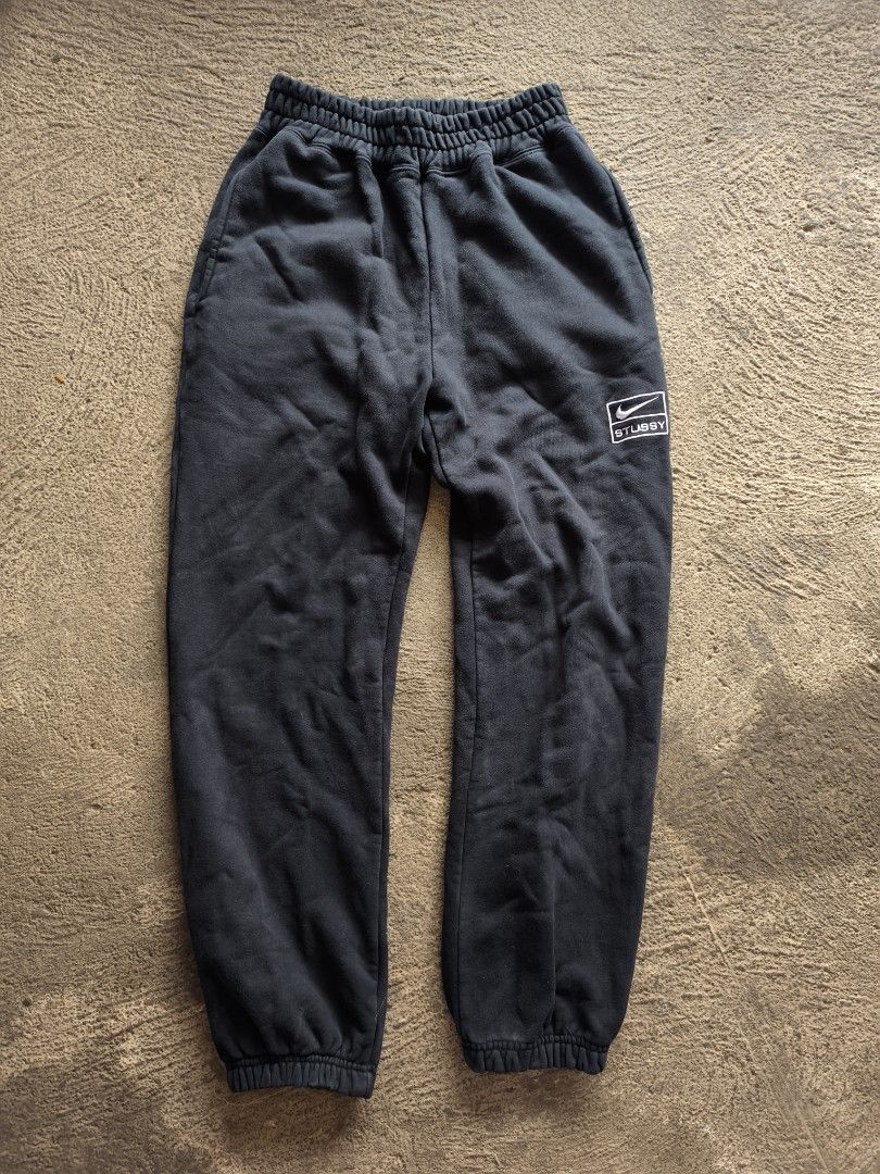 STUSSY X NIKE JOGGER (Category: Joggers) located in Cotabato. Submitted by sentimentalgoodz (Listing ID 1469161687, Image 1). Description: STUSSY X NIKE JOGGER 8.5/10 CONDITION SIZE 30-32 NO FLAWS.