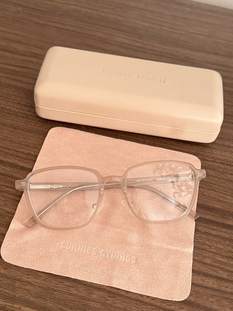 Sunnies Studios Optical Frame Jensen Honey (Category: Sunglasses & Eyewear) located in San Pedro. Submitted by etc05 (Listing ID 1469008659, Image 1). Description: - Brand: Sunnies Studios - Model: Jensen (Size 52) - Color: Honey (CS) with silver hardware - Shape: Square translucent frames - Condition: Brand new, never worn - Inclusions: Original beige hard case and matching recycled microsuede cleaning cloth.