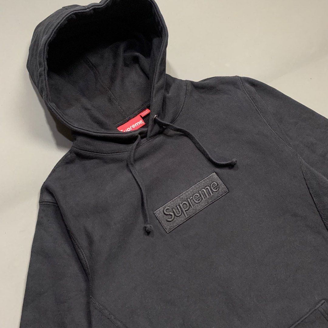 Supreme Black Box Logo Hoodie (Category: Hoodies) located in Kalibo. Submitted by gneiss2002 (Listing ID 1469050427, Image 2). Description: - black Supreme hoodie - Tonal black embossed box logo on chest - Classic heavyweight fleece fabric for warmth - Matching black drawstrings and kangaroo pocket - Red Supreme neck tag attached - Clean condition, heavy cotton material.