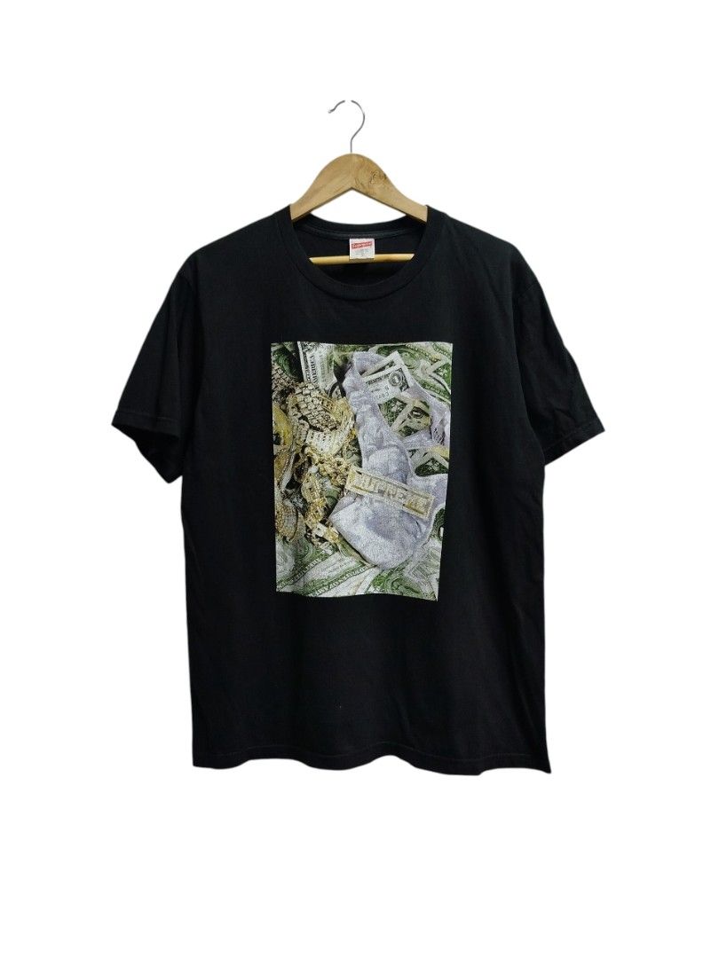 SUPREME BLING TEE (Category: Tshirts & Polo Shirts ) located in Bayombong. Submitted by Gentlemans_ClosEt (Listing ID 1468936633, Image 1). Description: SUPREME BLING TEE SIZE MEDIUM ON TAG DIMES: W21 X L29 GOOD CONDITION HAIRLINE CRACK PRINT.