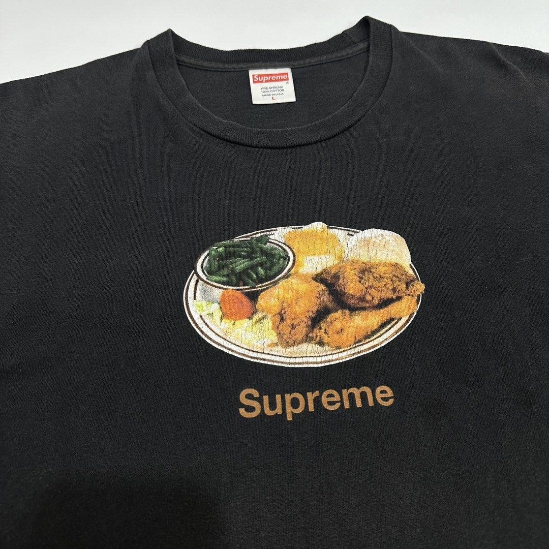 Supreme Chicken Dinner (SS18) black tee (Category: Activewear) located in Dagupan City. Submitted by unknownlootph (Listing ID 1468941314, Image 3). Description: Size: Large Width: 22 Length: 31 Condition: 8.5/10 Issue: hairline crackprints, pinholes (Legit/Authentic Item).