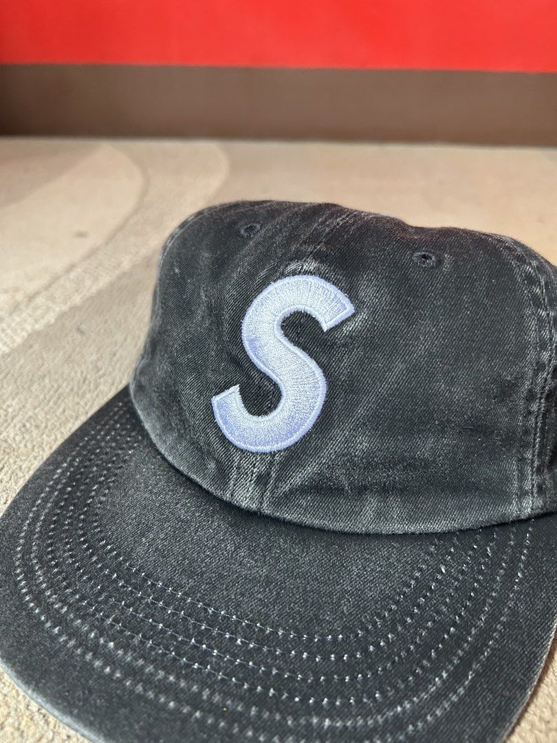 Supreme Pigment Coated S Logo 6panel Cap (Category: Caps & Hats) located in Abucay. Submitted by stuttt (Listing ID 1468995080, Image 2). Description: - Brand: Supreme - Style: S Logo 6-Panel Cap - Color: Black (Washed Cotton) - Details: White embroidered 'S' on front, Supreme lettering above back strap - Fit: Adjustable strap with metal hardware - Interior: Clean with contrast white lining and black taping - Origin: Made in USA - Condition: Bran