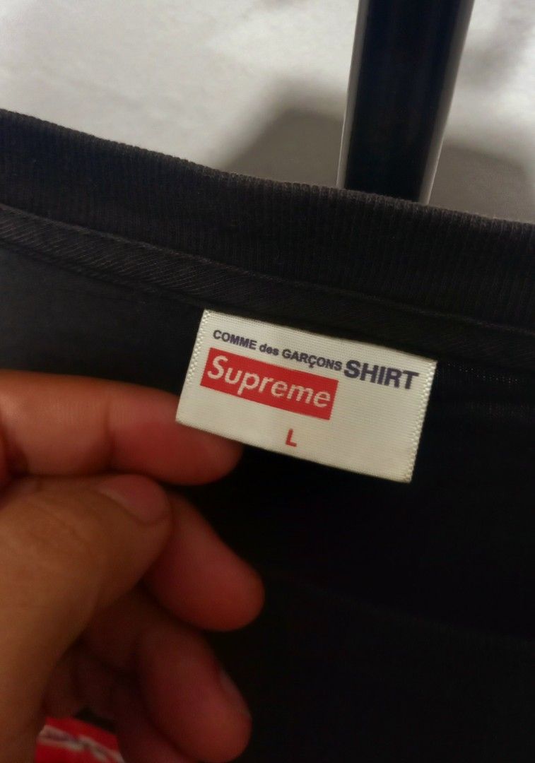 Supreme x Comme des Garcons SHIRT Split Box Logo Tee (Category: Tshirts & Polo Shirts ) located in Tarlac. Submitted by den420 (Listing ID 1469108545, Image 3). Description: - Brand: Supreme x Comme des Garcons SHIRT - Item: Split Box Logo T-Shirt - Color: Black - Size: Large - Material: 100% Cotton, Made in USA - Details: Front graphic print with classic branding, woven neck and wash tags intact.