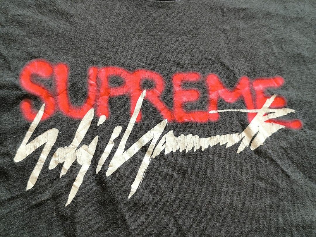 SUPREME x YOHJI YAMAMOTO (Category: Tshirts & Polo Shirts ) located in Cotabato. Submitted by sentimentalgoodz (Listing ID 1469161798, Image 2). Description: SUPREME x YOHJI YAMAMOTO 8/10 CONDITION 21/29 DIMENSION ISSUE PINHOLE.