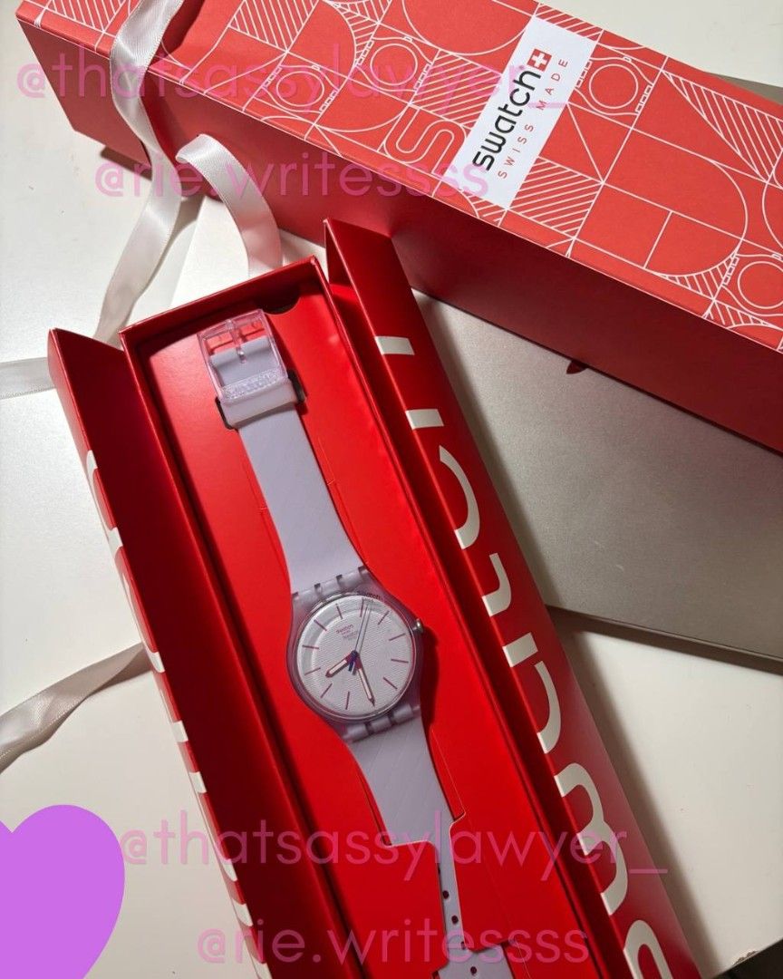 Swatch Lavendaze SO29V101 (Category: Women's Watches) located in Quezon City. Submitted by shopwithrie (Listing ID 1469032810, Image 2). Description: - Model: Swatch Lavendaze (SO29V101) - Condition: Clean piece, meticulously kept inside the box - Strap: Light lavender silicone strap with a textured chevron pattern - Case & Dial: Translucent case, patterned white dial with pink hour and minute markers, plus a contrasting blue second hand - Inclus