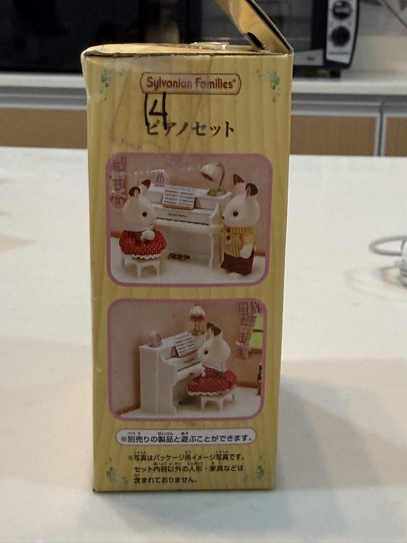 Sylvanian Families Piano Set (Category: Figurines & Statues) located in General Trias. Submitted by brightdog-224c (Listing ID 1468934048, Image 2). Description: Box Condition shows light shelf wear with minor corner creasing, but all original components inside are complete and intact..