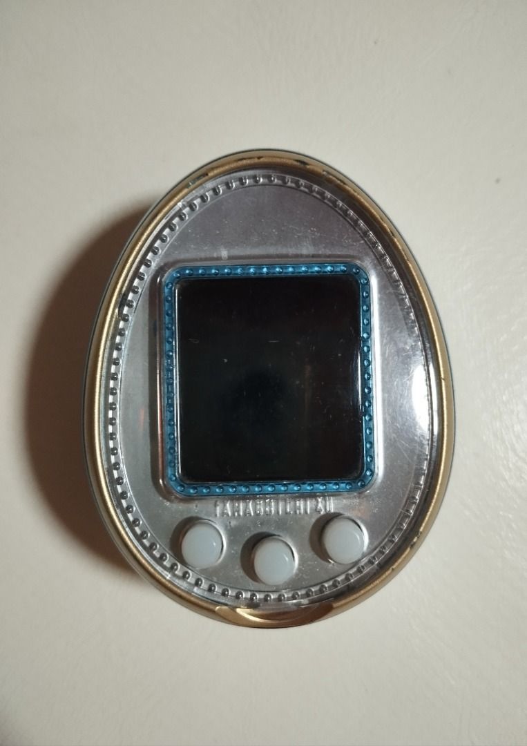 Tamagotchi 4U (Category: Interactive Toys) located in Davao. Submitted by OshareMajou (Listing ID 1469102729, Image 1). Description: Tamagotchi 4U Fully working. Please refer to the uploaded pics Display: Front color screen with 3 physical buttons Power: Uses 2 AAA batteries (battery cover included) Condition: battery terminals with corrosion but, still in working condition. PM for more details. Selling it as is. As I am decluttering my stuffs I 