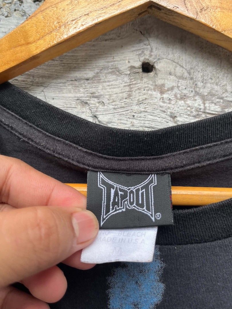 Tap Out (Category: Tshirts & Polo Shirts ) located in Manila. Submitted by skippypeanut1331 (Listing ID 1468966831, Image 3). Description: 17.5x26 Small Good Condition Color rate: 9/10 Issue: multiple pinhole, loose thread.