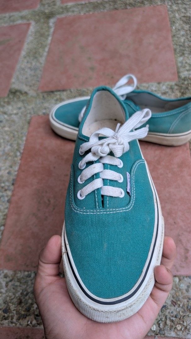 Teal Canvas Low Top Sneakers Size 38 (Category: Sneakers) located in Manila. Submitted by alyssaapac81898 (Listing ID 1468999025, Image 2). Description: - Color: Teal green with white laces and rubber soles - Style: Low top, easy slip-on design - Size: 38 (marked on insole) - Condition: Normal signs of wear on fabric and soles, still solid and durable - Perfect for: Casual everyday wear, pairs well with jeans and shorts price is negotiable locati