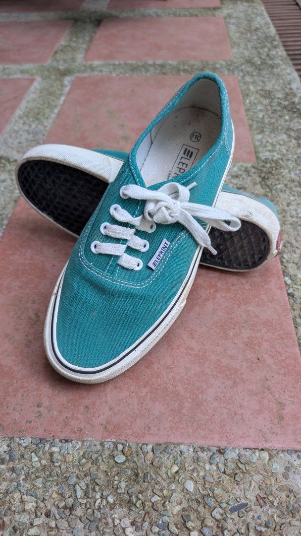 Teal Canvas Low Top Sneakers Size 38 (Category: Sneakers) located in Manila. Submitted by alyssaapac81898 (Listing ID 1468999025, Image 3). Description: - Color: Teal green with white laces and rubber soles - Style: Low top, easy slip-on design - Size: 38 (marked on insole) - Condition: Normal signs of wear on fabric and soles, still solid and durable - Perfect for: Casual everyday wear, pairs well with jeans and shorts price is negotiable locati