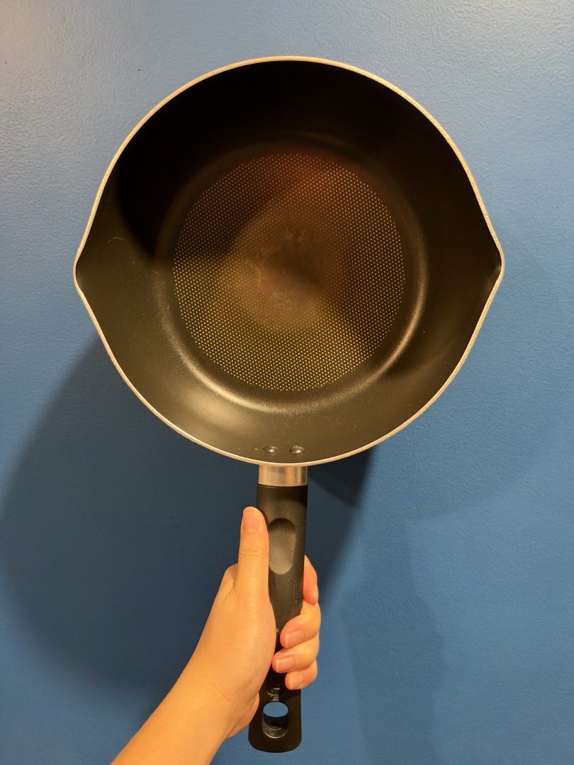 Tefal Induction Technology Saucepan Pot Cookware (Category: Cookware & Accessories) located in Manila. Submitted by garagesalebykoda (Listing ID 1469083907, Image 2). Description: - Brand: Tefal induction saucepan - Design: Copper-coloured exterior, dark handle, and dual pouring spouts - Interior: Textured non-stick cooking surface - Condition: Bottom shows heat discoloration/stains from use, but still solid and works perfectly on induction - Rea