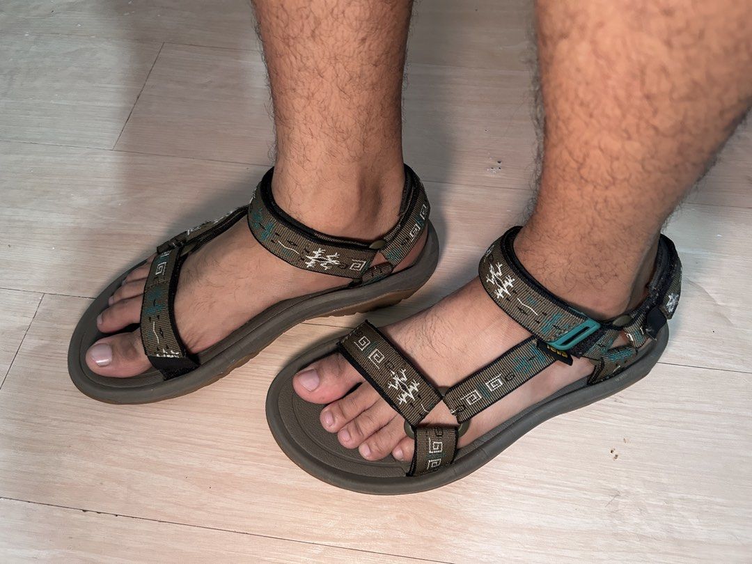 Teva Patterned Outdoor Sandals (Category: Slippers & Slides) located in Dipolog. Submitted by adrian281994 (Listing ID 1469099192, Image 3). Description: - Brand: Teva - Colorway: Earth-tone with geometric woven straps - Fit: Adjustable hook-and-loop closures at the ankle, forefoot, and heel - Sole: Durable rubber outsole with textured footbed for superior grip - Best for: Walking, hiking, or everyday casual wear - Condition: Minimal signs of pre