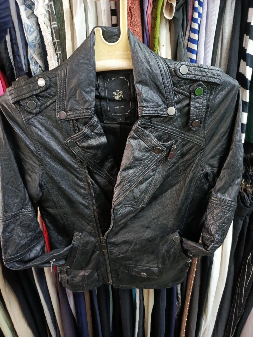 The Eighty Twenty Black Label Lamb Leather Jacket Size S (Category: Coats, Jackets and Outerwear) located in Cabatuan. Submitted by penthegreat (Listing ID 1469111530, Image 1). Description: - Brand: The Eighty Twenty Black Label - Material: Genuine black lamb leather with acetate lining - Size: S - Design: Asymmetric zip front with stylish quilted paneling on shoulders and back - Details: Chic snap button accents - Care: Professional leather dry