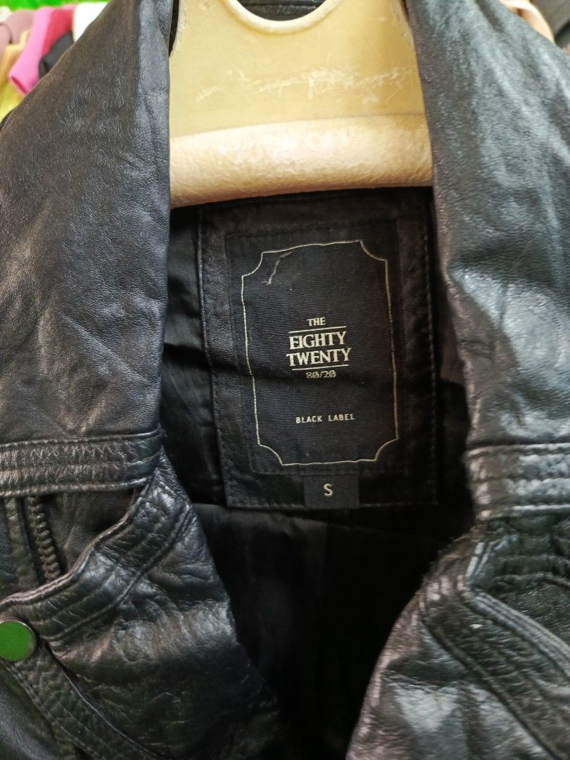 The Eighty Twenty Black Label Lamb Leather Jacket Size S (Category: Coats, Jackets and Outerwear) located in Cabatuan. Submitted by penthegreat (Listing ID 1469111530, Image 3). Description: - Brand: The Eighty Twenty Black Label - Material: Genuine black lamb leather with acetate lining - Size: S - Design: Asymmetric zip front with stylish quilted paneling on shoulders and back - Details: Chic snap button accents - Care: Professional leather dry