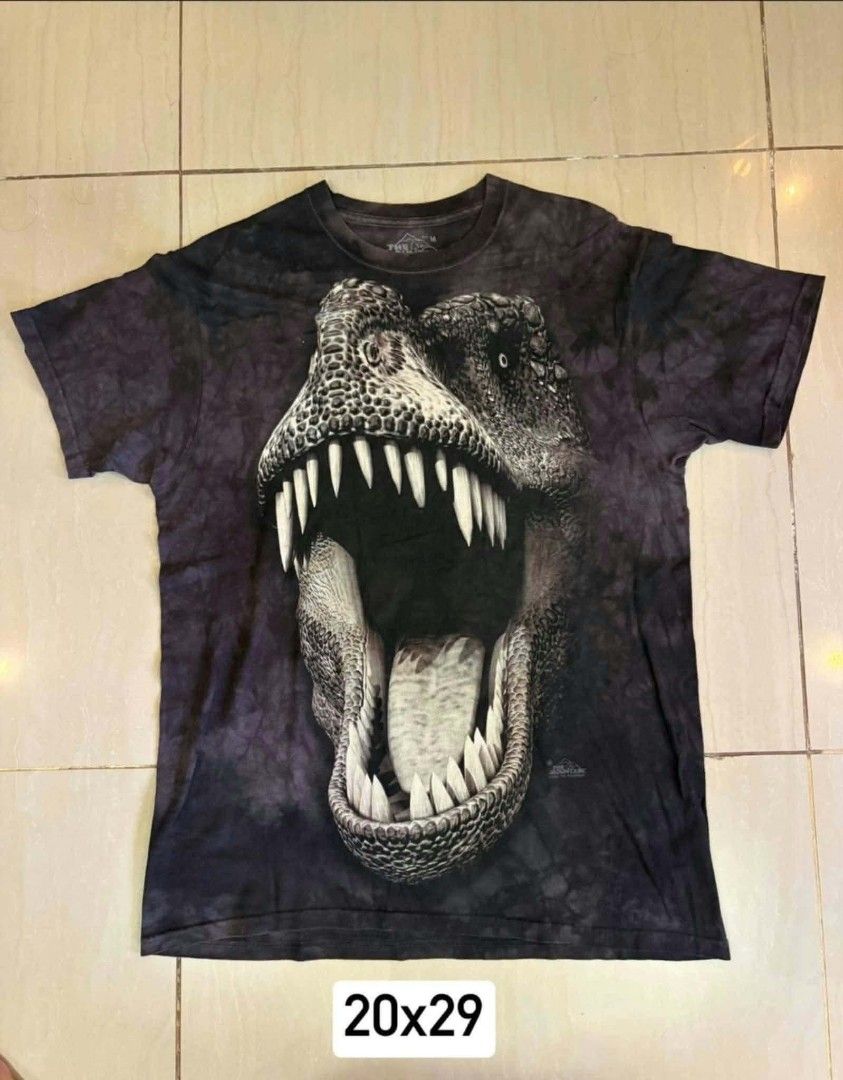 The Mountains T-Rex Glow (Category: Tshirts & Polo Shirts ) located in Manila. Submitted by boldriver-4708 (Listing ID 1468937876, Image 1). Description: Details on pics Good Condition no issues M to Large Glow in the Dark.