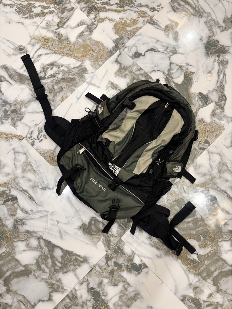 The North Face Fire-Wall Backpack Green Black (Category: Backpacks) located in Cavite. Submitted by gelloots (Listing ID 1469047015, Image 1). Description: Authentic green and black The North Face Fire-Wall backpack. Features an Air Trans ventilation back panel, padded shoulder straps, multiple compartments, and mesh side pockets. Built tough for the outdoors with some minor dust and light wear on lighter panels. Ready for your next adventure! Ne