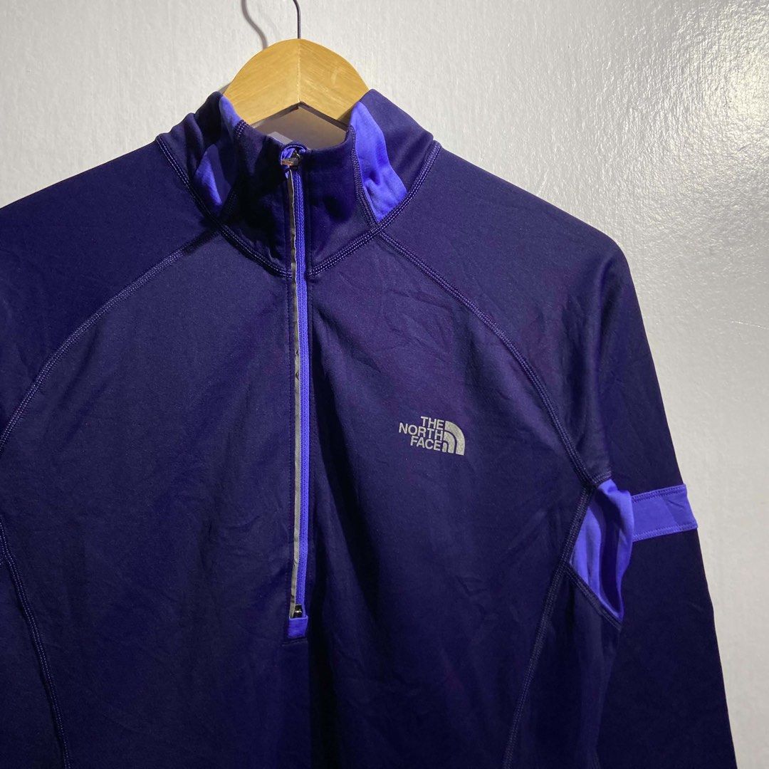 The North Face FlashDry Purple Women's Pullover Jacket Medium (Category: Coats, Jackets and Outerwear) located in Roxas City. Submitted by vaultcultureco. (Listing ID 1469093035, Image 2). Description: - Brand: The North Face - Style: Women's half-zip pullover - Size: Medium - Color: Dark purple with bright purple collar and sleeve stripe accents - Material/Tech: FlashDry technology for quick-drying comfort - Extra Features: Small zippered pocket