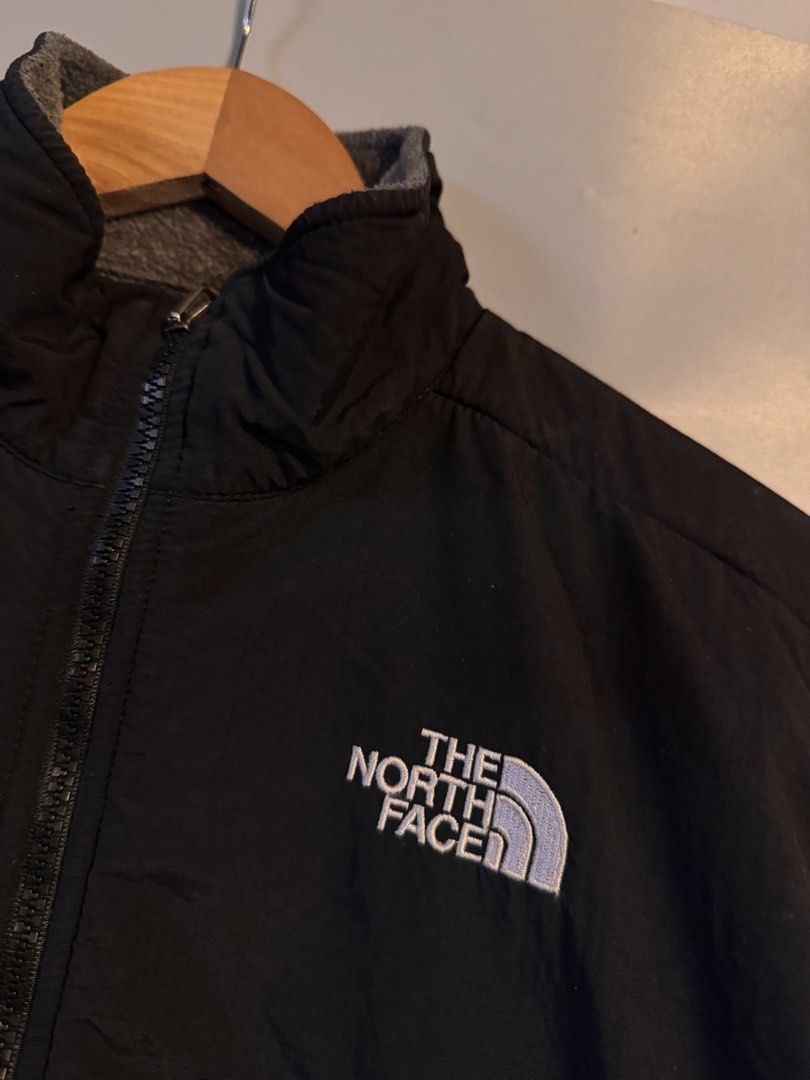 The North Face Polartec Fleece Jacket (Category: Coats, Jackets and Outerwear) located in Alaminos. Submitted by outfitcheck.ph (Listing ID 1469101587, Image 2). Description: - Authentic The North Face fleece jacket - Premium Polartec fabric for superior warmth and comfort - Stylish black and grey colorblock design - Full zip closure with a protective high collar - Two convenient zippered front hand pockets - Embroidered brand logos on the chest 