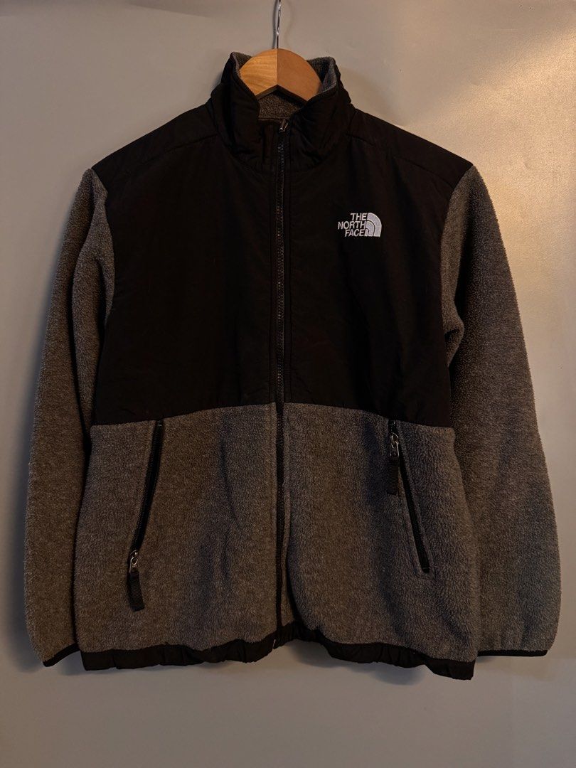 The North Face Polartec Fleece Jacket (Category: Coats, Jackets and Outerwear) located in Alaminos. Submitted by outfitcheck.ph (Listing ID 1469101587, Image 1). Description: - Authentic The North Face fleece jacket - Premium Polartec fabric for superior warmth and comfort - Stylish black and grey colorblock design - Full zip closure with a protective high collar - Two convenient zippered front hand pockets - Embroidered brand logos on the chest 