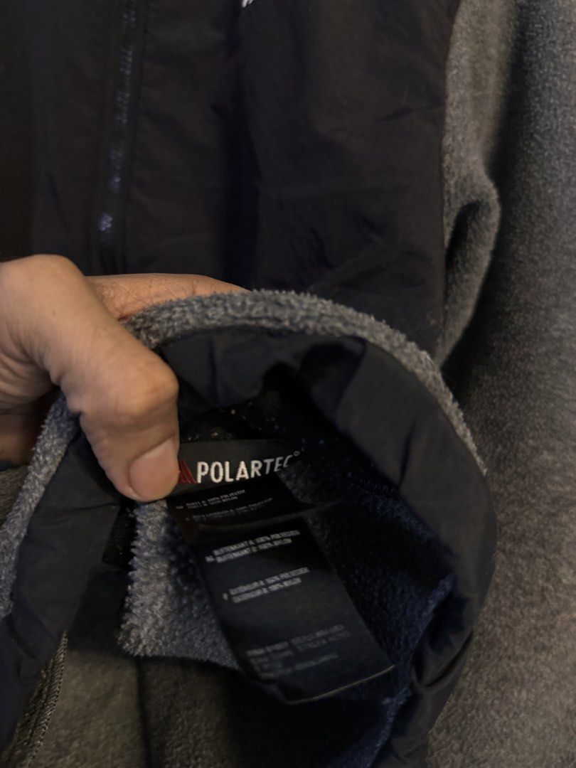 The North Face Polartec Fleece Jacket (Category: Coats, Jackets and Outerwear) located in Alaminos. Submitted by outfitcheck.ph (Listing ID 1469101587, Image 3). Description: - Authentic The North Face fleece jacket - Premium Polartec fabric for superior warmth and comfort - Stylish black and grey colorblock design - Full zip closure with a protective high collar - Two convenient zippered front hand pockets - Embroidered brand logos on the chest 