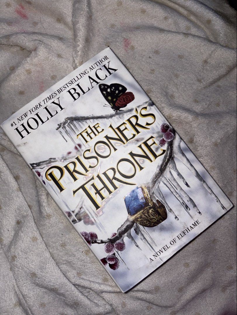 The Prisoner’s Throne by Holly Black (Category: Storybooks) located in Quezon City. Submitted by maraqee (Listing ID 1469054501, Image 1). Description: - Part of the “A Novel of Elfhame” series. - Hardbound.