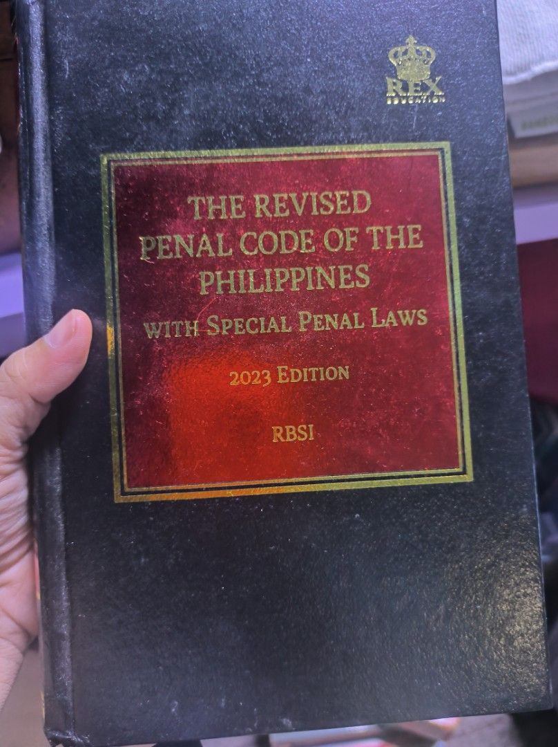 The Revised Penal Code of the Philippines 2023 Edition Rex (Category: Textbooks) located in Manila. Submitted by leivon (Listing ID 1469085115, Image 1). Description: - Title: The Revised Penal Code of the Philippines with Special Penal Laws (2023 Edition) - Publisher: Rex Book Store (Compiled and edited by RBSI) - Format: Hardcover (Black cover with distinct red title box) - Condition: Clean pages and solid spine - Ideal for: Law students, bar r