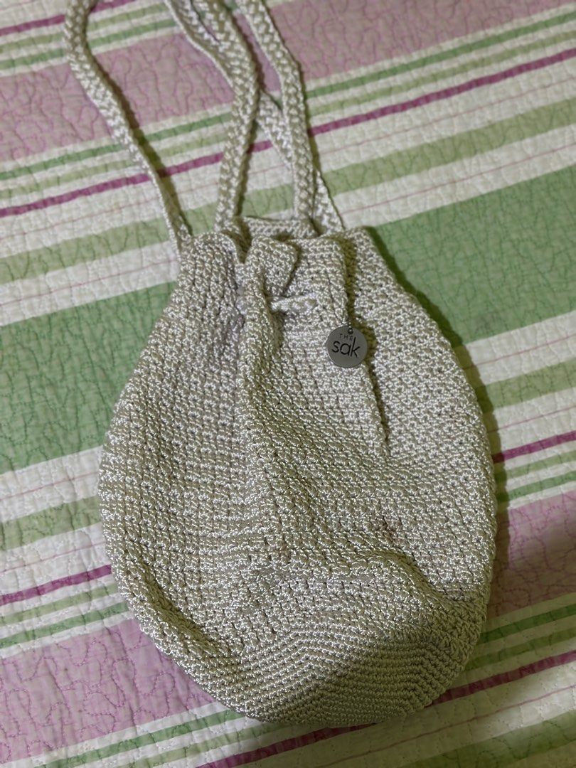 The sak hand-crocheted drawstring in cream white (Category: Backpacks) located in Pagsanjan. Submitted by leyuxdenini (Listing ID 1469031977, Image 1). Description: clean and good condition Rfs: Di nagagamit.