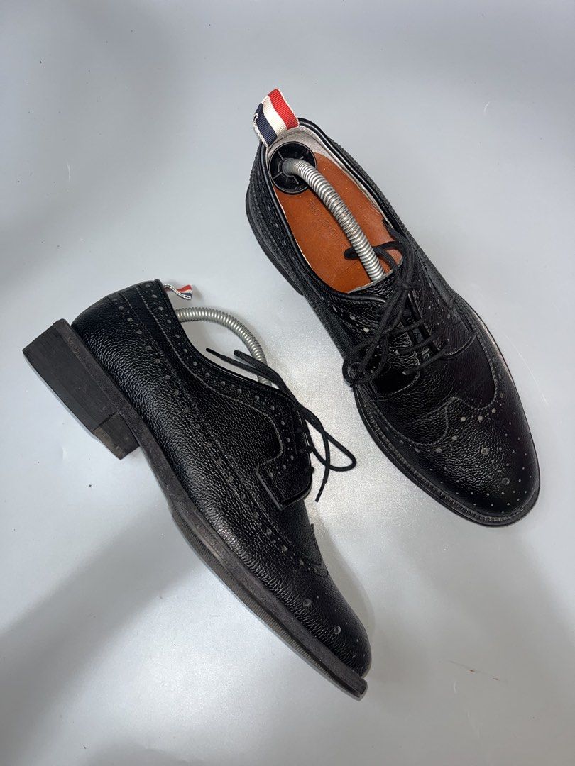 Thom Browne Pebble-Grain Leather Longwing Brogues in black. (Category: Casual Shoes) located in Lala. Submitted by adrian.885 (Listing ID 1469143591, Image 3). Description: Thom Browne Pebble-Grain Leather Longwing Brogues in black ISSUE: EXPIRE ANG LOOB PWEDE NAMAN RANGGALIN OPEN FOR RESERVATION FOR 15 days Down payment 350 pesos.