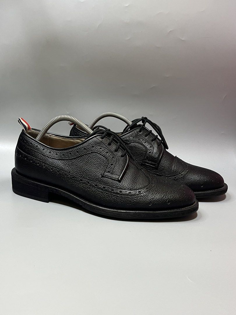 Thom Browne Pebble-Grain Leather Longwing Brogues in black. (Category: Casual Shoes) located in Lala. Submitted by adrian.885 (Listing ID 1469143591, Image 1). Description: Thom Browne Pebble-Grain Leather Longwing Brogues in black ISSUE: EXPIRE ANG LOOB PWEDE NAMAN RANGGALIN OPEN FOR RESERVATION FOR 15 days Down payment 350 pesos.