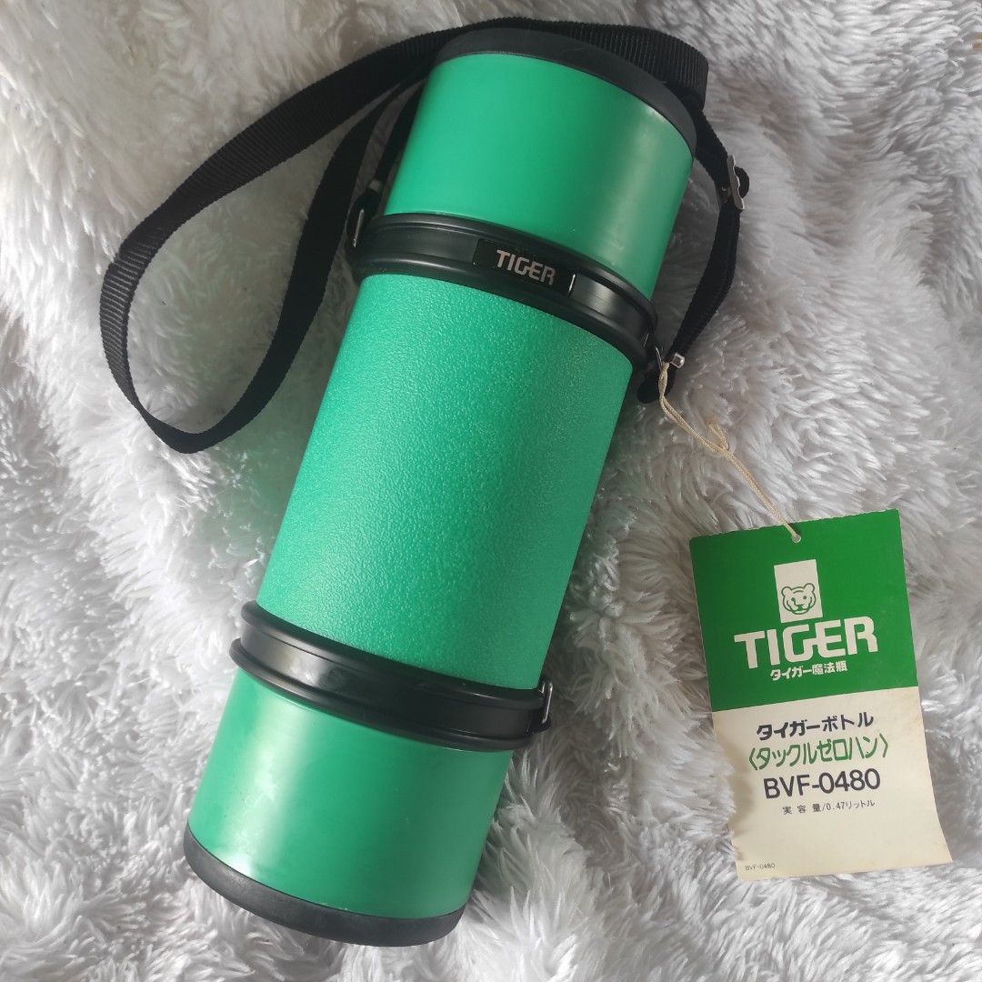 Tiger Vacuum Bottle Green (Category: Water Bottles & Tumblers) located in Cainta. Submitted by fukunekojapansurplus (Listing ID 1468979194, Image 1). Description: 💸350 PESOS Tiger Pic Thermos (Tackle-Zero-Han) vacuum-insulated glass flask in green (model BVF-0480). • Tiger Vacuum Bottle / タイガー魔法瓶) • Model: BVF-0480 (Tackle-050 / Tackle Zero-Han / タックルゼロハン) • Capacity: 0.48 liters • Dimensions: Approximately 9.5 cm in diameter and 26.5 cm in heig