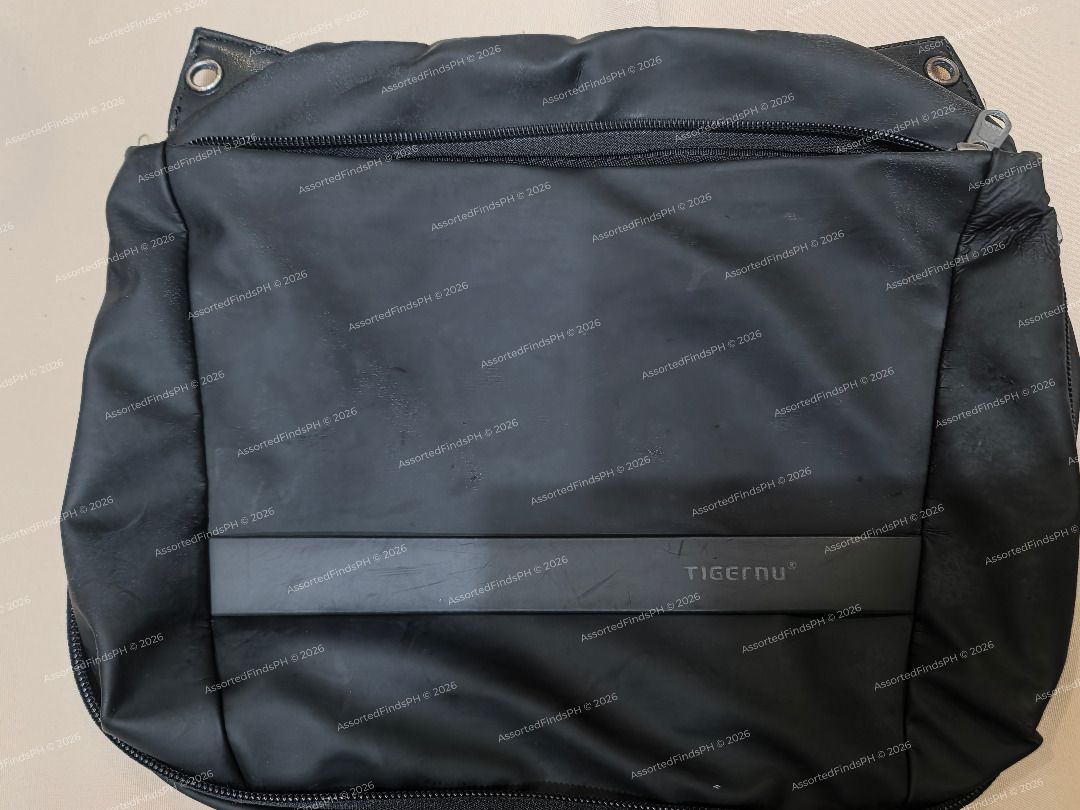 TIGERNU Messenger Bag (READ DESCRIPTION) (Category: Sling Bags) located in Quezon City. Submitted by assortedfindsph (Listing ID 1469035159, Image 1). Description: “Post will be marked as SOLD once sold.” Selling my TIGERNU Messenger Bag for 250 (FIXED) Firm Price, LP Inquiries will not be entertained Date of Purchase: December 2025 Honest Issue: Bigla na lang naputol ang strap. May mga replacement strap naman na pwedeng hanapan. May signs of wea
