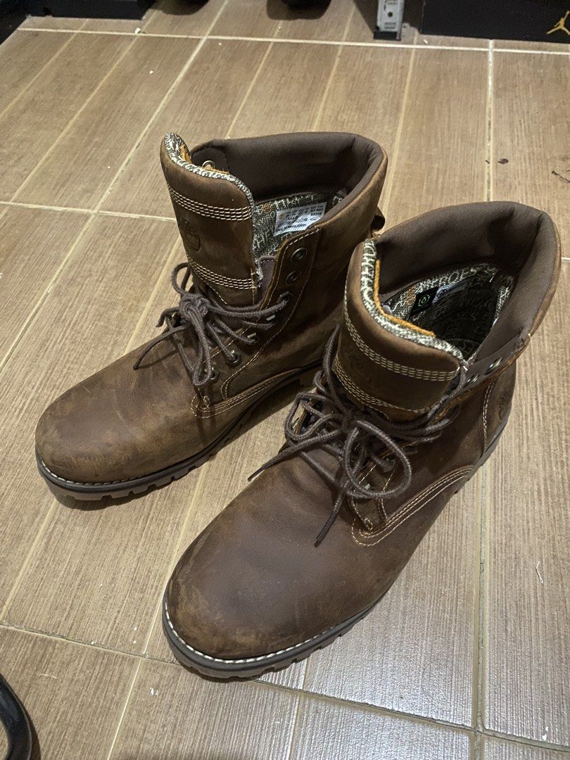 Timberland Brown Leather Boots (Category: Boots) located in Bacoor. Submitted by jabbawantkiss (Listing ID 1469107942, Image 1). Description: - Brand: Timberland - Material: Premium brown leather with fabric inner lining - Design: Lace-up style with padded collars and heel pull tabs - Sole: Sturdy lug sole for superior traction - Condition/Usage: Solid construction, perfect for outdoor activities or casual wear.