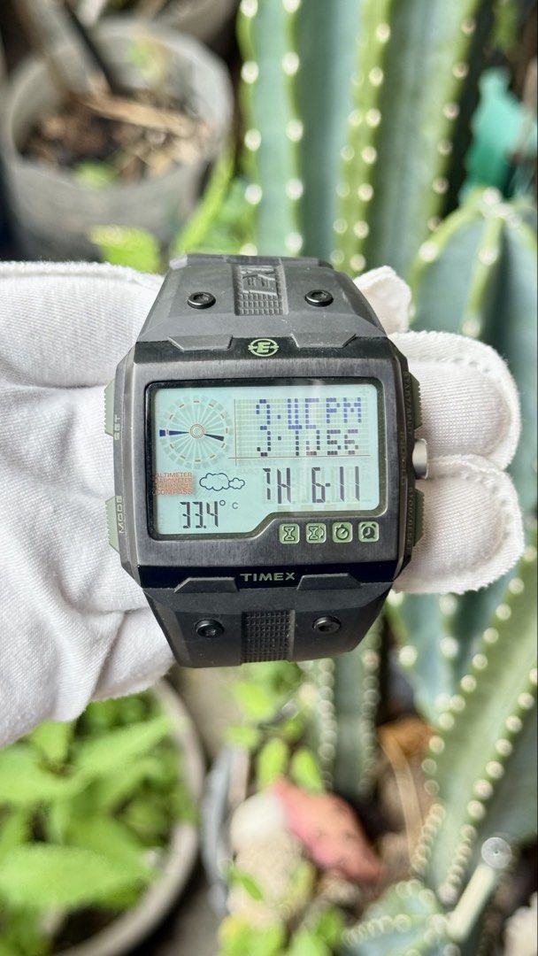 Timex EXPEDITION WS4 Altimeter Barometer Thermometer Compass Digital Watch (Category: Men's Watches) located in Manila. Submitted by junjun12356 (Listing ID 1469160372, Image 1). Description: - Brand: Timex outdoor digital watch - Color: Black resin with green accent buttons and black rubber strap - Sensors: Tracks altitude, barometric pressure, temperature, and compass - Features: Multi-function display, weather icon, and Indiglo backlight - Con