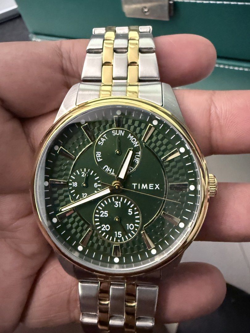 Timex Two-Tone Green Dial Watch with Box (Category: Women's Watches) located in Manila. Submitted by aandrarama02356 (Listing ID 1468935499, Image 2). Description: Personal Collection Downsizing ⌚ Model: Timex TW2Y21400 Two-Tone Chicago Collection Ref: TW2Y21400 Water Resist: 50M Movement: Timex Quartz Bracelet: Stainless Steel, Two Tone Color: Green Two-Tone Condition: 9/10 Inclusions: Full Set with Box & Card Issues: None Price Firm: ₱7500 📍 L