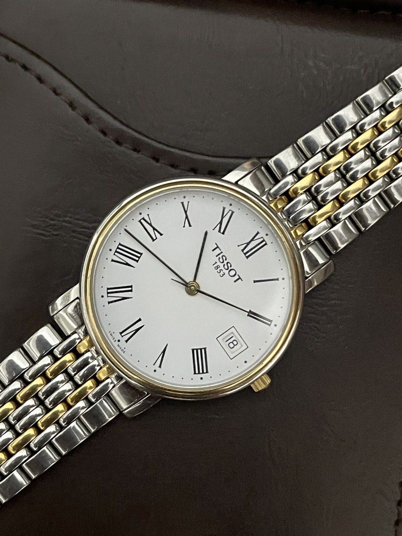 Tissot T-Classic Desire Two tone (Category: Luxury Watches) located in Las Pinas. Submitted by jhersan24 (Listing ID 1468966081, Image 2). Description: Tissot T-Classic Desire Two Tone Caseback: Stainless steel Two Tone Stainless Steel Bracelet Quartz Movement Model: T870/970 Shape: Round Sapphire Crystal White Dial Roman Dial Index Date Display Deployment Clasp 30M Water Resistance Approximate Case Diameter: 35mm Approximate Case Thickness: 5.85